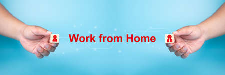 Man hand hold wooden cube onÂ hospitalÂ blue background banner with word social distancing in between Concept for lockdown to pandemic disease spread of COVID-19 coronavirus, people Respiratory illnessの写真素材