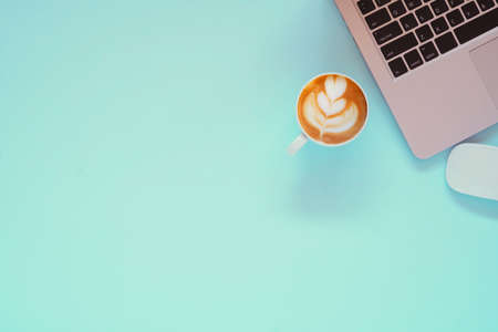 Vintage Tablet mockup flat lay on blue table top background texture space concept workspace office blank note, smartphone film montage, plan internet e-commerce business blogger idea empty wooden viewの写真素材