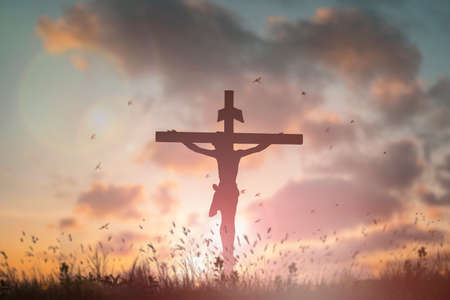 Silhouette Jesus christÂ deathÂ on cross crucifixion on calvary hill in sunset good friday risen in easter day concept for ChristianÂ praise forÂ holy spirit religiousÂ God,Â Catholic prayingÂ background.の写真素材