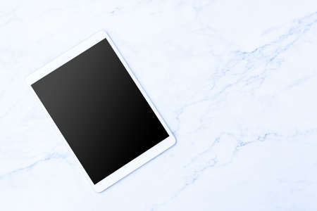Vintage Tablet mockup flat lay on old white marble table top view background texture empty space concept above workspace office blank note, plan on business calendar, blogger ideaの写真素材