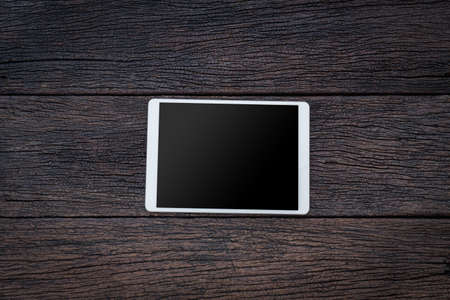 Vintage smartphone mockup flat lay on old wood table top wood background texture space concept workspace office blank empty display view, stay and work business blogger idea at homeの写真素材