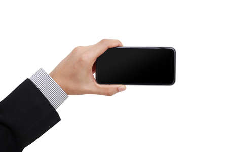 Woman hand holding and showing blank smartphone screen on  white background    display concept.Â Hand  business man hold smartphone take pictures the landscape horizontalの写真素材