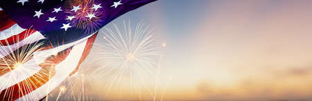 Celebration colorful firework on America flag pattern on sky background, red blue white strip concept for USA 4th july independence day, symbol of patriot freedom and democracy in memorial day festiveの写真素材