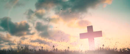 Silhouette jesus christ crucifix on cross on calvary sunset background concept for good friday he is risen in easter day, good friday jesus death on crucifix, world christian and holy spirit religious.の写真素材