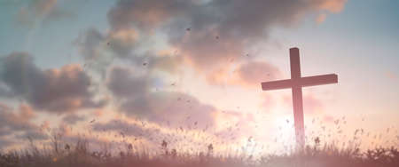 Silhouette jesus christ crucifix on cross on calvary sunset background concept for good friday he is risen in easter day, good friday jesus death on crucifix, world christian and holy spirit religious.の写真素材