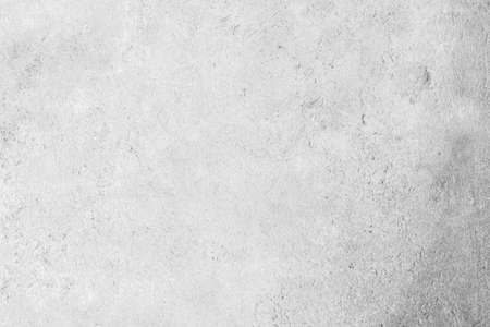 Modern grey paint limestone texture background in white light seam home wall paper. Back flat subway concrete stone table floor concept surreal granite quarry stucco surface background grunge pattern.の写真素材