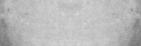 Panoramic grey paint limestone texture background in white light seam home wall paper. Back flat wide concrete stone table floor concept surreal granite quarry stucco surface grunge panorama landscape.の写真素材