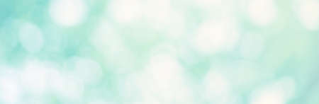 Abstract green Bokeh blur leaf spring nature light eco Blue foliage background concept for cool summer texture, bio spring calm day, organic health in turquoise wallpaper, blurred focus park leaf.の写真素材