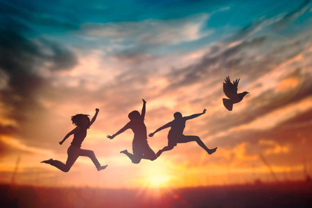 Happy family people group celebrate jump for good life on weekend concept for win victory, person faith in financial freedom healthy wellness, Great insurance team support retreat together in summer.の写真素材