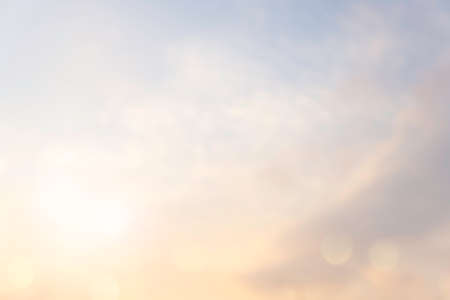 Abstract blur morning nature sky bokeh texture background concept for calm faith horizon landscape, Clean sunset blurry light, sunshine on sand beach color of blue teal, relax Autumn weather.の写真素材