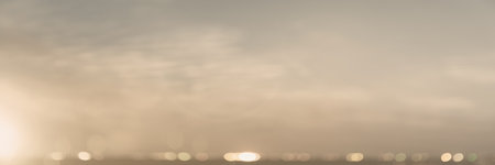 Abstract blur morning nature sky bokeh texture background concept for calm faith horizon landscape, Clean sunset blurry light, sunshine on sand beach color of blue teal, relax Autumn weather.の写真素材