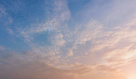 Summer Blue Sky and white cloud white background. Beautiful clear cloudy in sunlight calm season. Panoramic vivid cyan cloudscape in nature environment. Outdoor horizon skyline with spring sunshine.の写真素材