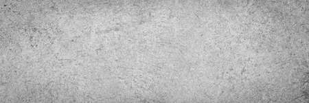 Panoramic grey paint limestone texture background in white light seam home wall paper. Back flat wide concrete stone table floor concept surreal granite quarry stucco surface grunge panorama landscape.の写真素材