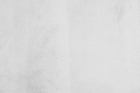 Modern grey paint limestone texture background in white light seam home wall paper. Back flat subway concrete stone table floor concept surreal granite quarry stucco surface background grunge pattern.の写真素材
