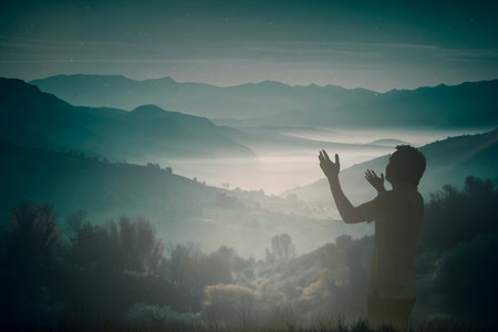 Happy man thinking felling ambitious empowerment energy vision on moutain background. Christian prayer love freedom worship praise God. Strength courage self confidence good for yourself concept 2024の写真素材