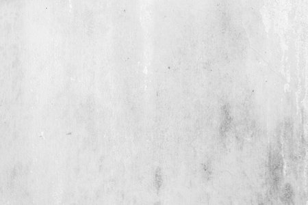 Grey brush paint limestone texture background in white light marble wall paper. Back wide concrete stone table tops view floor plaster pattern granite bacground surface seamless grunge wide panorama.の写真素材