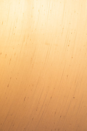 Fabric gold cotton cloth texture with lank soft material space for text and idea design. Clean wool pleat woven concept insert detail image, cover retro plain used for new decorative element backgroundの写真素材