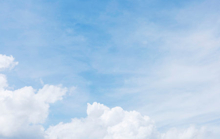 Bright Blue Sky with White Cloud background: A Clear Summer Day with Light Gradients winter cloudy and Nature Beauty texture, Horizon air in summer day. abstract Landscape spring Viewの写真素材