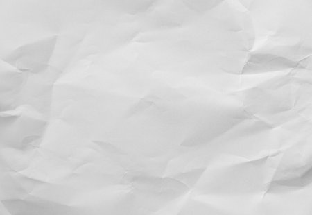Crumpled paper texture crease natural background authenticity imperfection white sheet smooth matte paper unmarked symbolizing purity minimalism plain surface Paper art highlights organic fibers grainの写真素材
