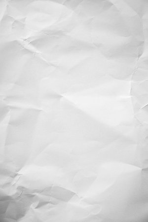 Crumpled paper texture crease natural background authenticity imperfection white sheet smooth matte paper unmarked symbolizing purity minimalism plain surface Paper art highlights organic fibers grainの写真素材