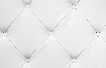 Wide Light white luxury upholstery sofa texture background concept for clean gray vintage leather furniture pattern wallpaper, Panoramic elegant armchair mattress surface detail, real material.の写真素材