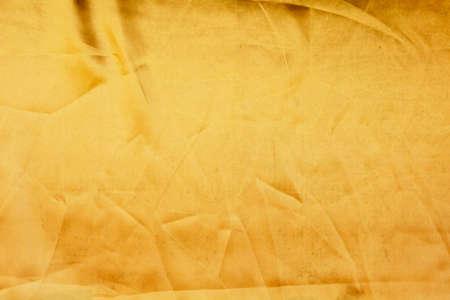 Gold fabric texture backgroundの写真素材