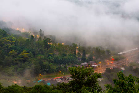 Early morning scenery of beautiful scenary valley of mountain at village color on the mist in the fieldの写真素材