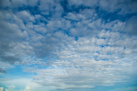 Blue sky background, black and white cloud in same sky. People have good and bad side in own mind