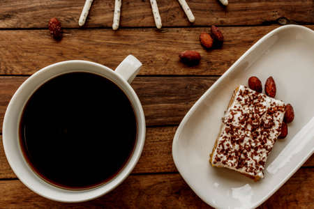 a treat for breakfast and hot flavored coffeeの写真素材