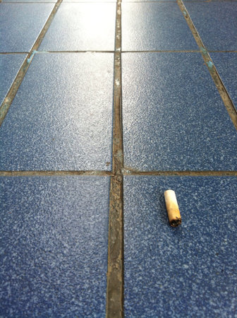 Cigarette on floor