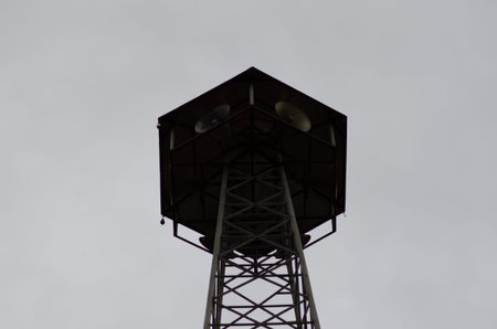 Telephone broadcast radio pole silhouette on  background