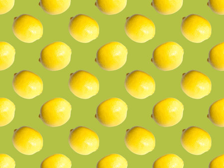 Seamless pattern with lemon. Lemon on a light green background.の写真素材