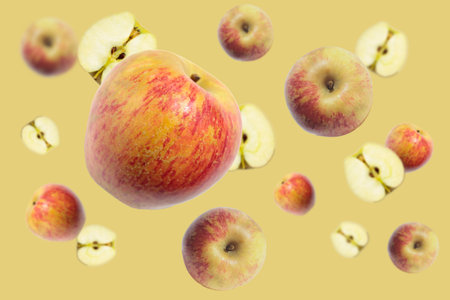 Levitation of a whole apple and a half on a light cream background.