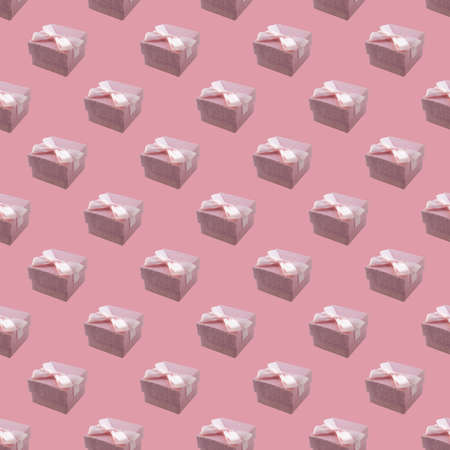 Seamless geometric pattern, pink gift box with a bow on a pink background. Simple drawing for any surface. Packaging.の写真素材