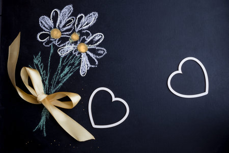 Postcard for the holiday of Valentine's Day, birthday, women's day. Blackboard with chalk-drawn...