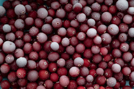 Background with frozen cranberries for the poster. Natural vitamins and antioxidantsの写真素材
