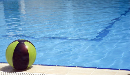 A Ball near the Pool