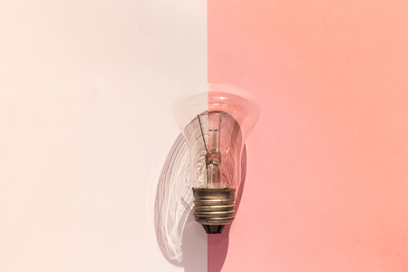 Idea Conception. A bulb on divided background from above. Top view.の写真素材