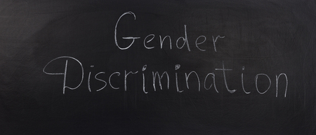 Gender discrimination Concept on Dark Background. Drawn with chalk on blackboardの写真素材