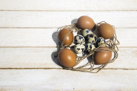 Happy Easter, Christianity and Christian tradition concept with Easter Eggs on wooden backgroundの写真素材