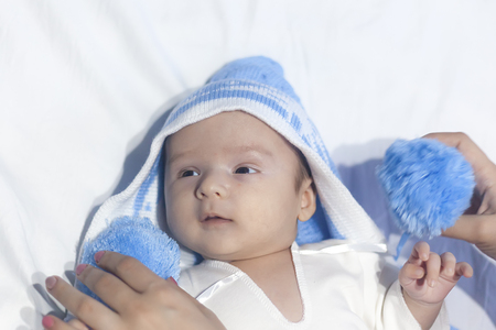 Beautiful newborn baby boy lying on white background. Copy spaceの写真素材