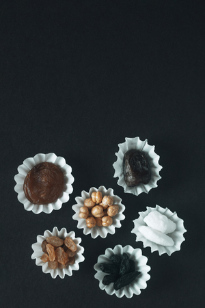 Eid Mubarak. Different iftar sweets. Celebrating Eid Al Adha. Islamic traditional holiday. Eid al-Fitr. Holly Ramadan. Middle East religious holiday. Iftar table decorated dried date fruit and sweets.の写真素材
