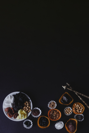 Eid Mubarak. Different iftar sweets. Celebrating Eid Al Adha. Islamic traditional holiday. Eid al-Fitr. Holly Ramadan. Middle East religious holiday. Iftar table decorated dried date fruit and sweets.の写真素材