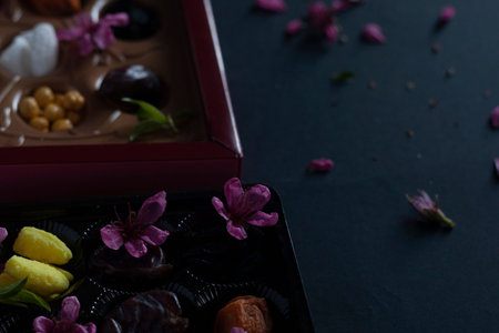 Eid Mubarak. Different iftar sweets. Celebrating Eid Al Adha. Islamic traditional holiday. Eid al-Fitr. Holly Ramadan. Middle East religious holiday. Iftar table decorated dried date fruit and sweets.の写真素材