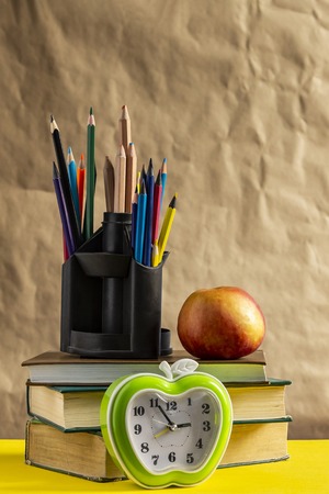 Back to school concept. Stack of books with school supplies.の写真素材