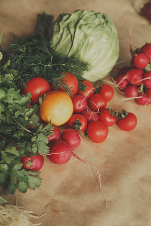 Healthy food background. Assortment of fresh vegetables on paper background. Copy space.の写真素材