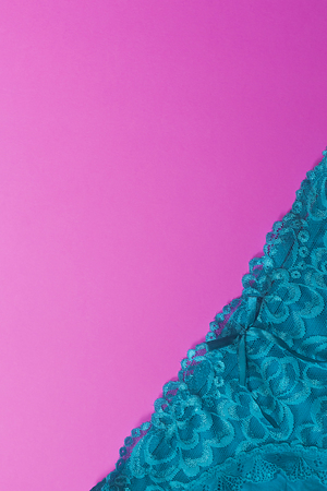 Women panties on pink. Blue women underwear on the pink background. Copy spaceの写真素材
