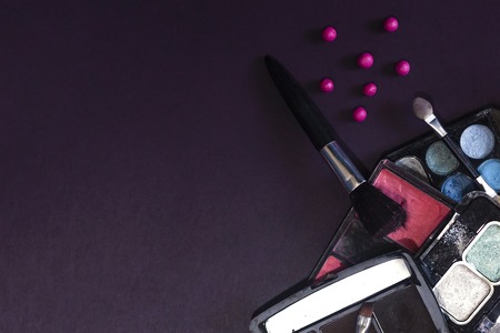 Women's cosmetics and accessories on paper background. Beauty products. View from above. Top view. Free spaceの写真素材
