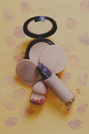 Women's cosmetics and accessories on paper background. Beauty products. View from above. Top view. Free spaceの写真素材