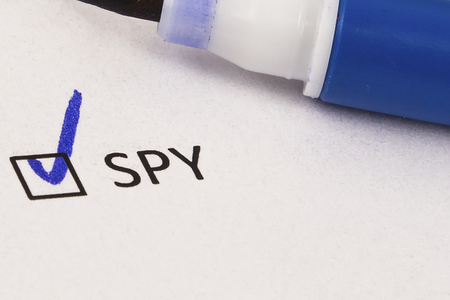 Questionnaire, survey. Checked box with inscription SPY and blue marker.の写真素材
